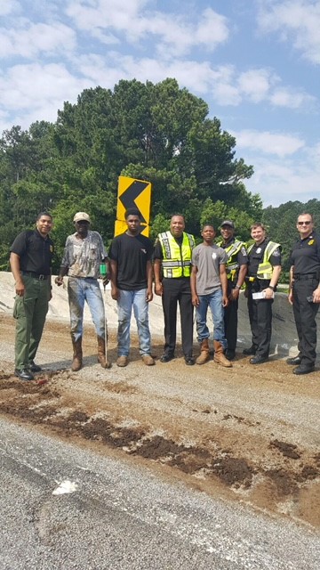 DeKalb County public safety employees provided emergency response assistance after a tractor trailer overturned on I-285