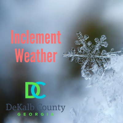 Close-up of a detailed snowflake against a blurred wintery background. Red text reads "Inclement Weather." DeKalb County, Georgia logo is at the bottom.