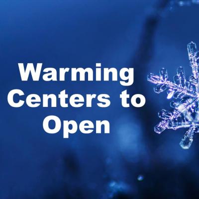 A close-up of a detailed snowflake against a dark blue background. The text "Warming Centers to Open" appears in bold white, conveying urgency.