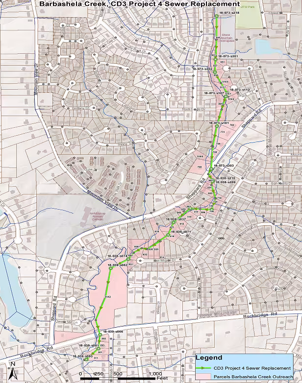 A DeKalb County map showing the Upper Barbashela Creek sewer replacement project marked with a green line with other areas marked in pink.