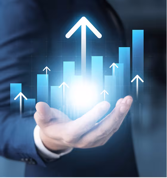 A man holding a graphic of a neon blue graph and white arrows point up in his hand.