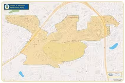 Map highlighting a proposed annexation area in yellow, surrounded by roads and residential areas. Includes a label for context and scale information.