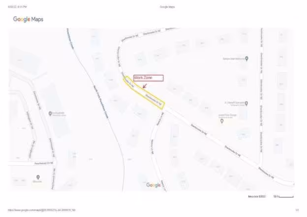 Map showing a neighborhood with streets and houses. A highlighted yellow area labeled "Work Zone" is on Brookwood Drive, indicating construction.