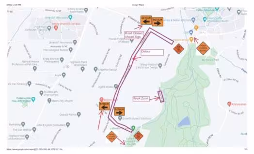 Map illustrating a detour in a residential area. Arrows and orange signs indicate a closed road and work zone, directing traffic around a park.