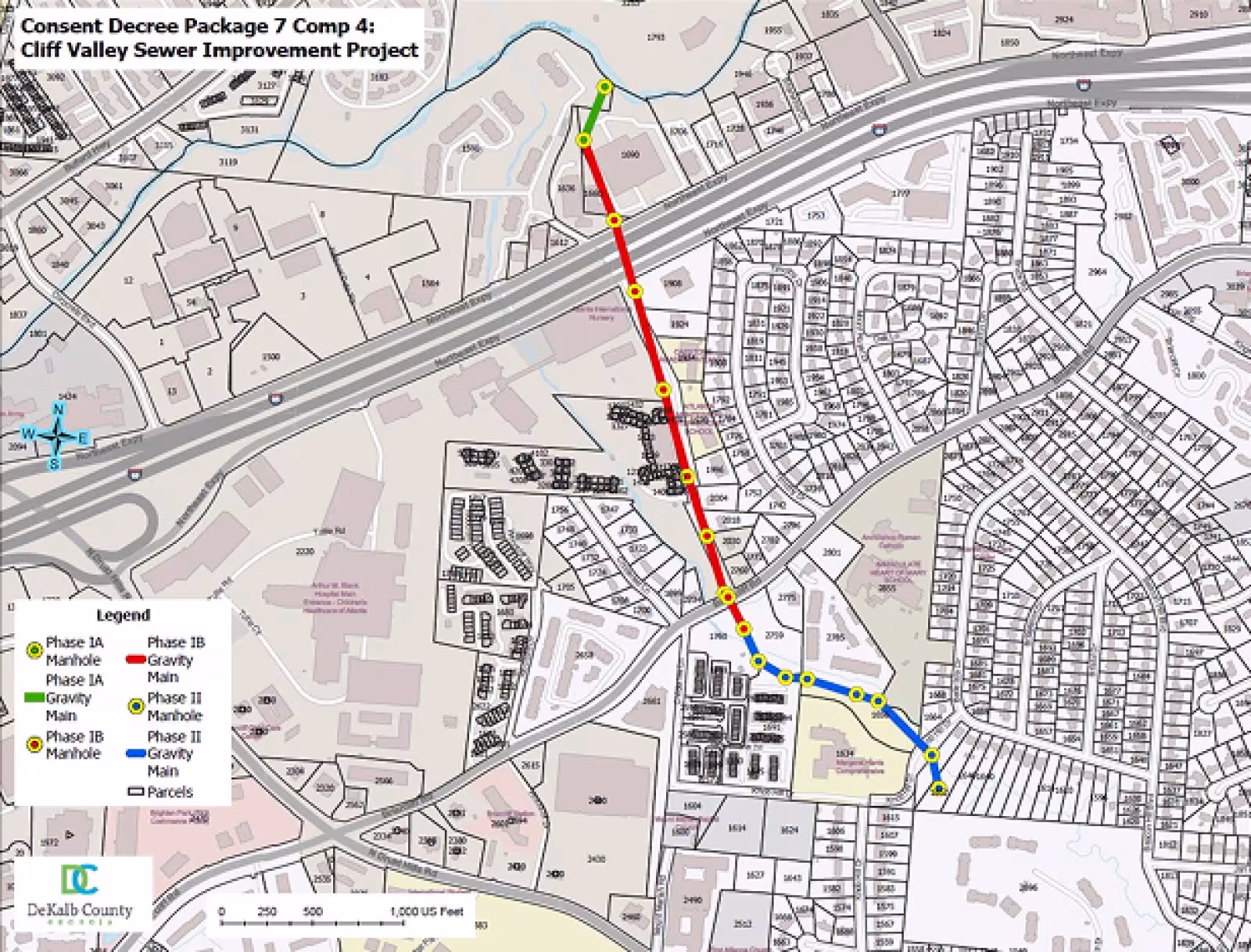 A DeKalb County map showing the Cliff Valley sewer improvement project marked with green, red, and blue lines with manholes marked with icons.