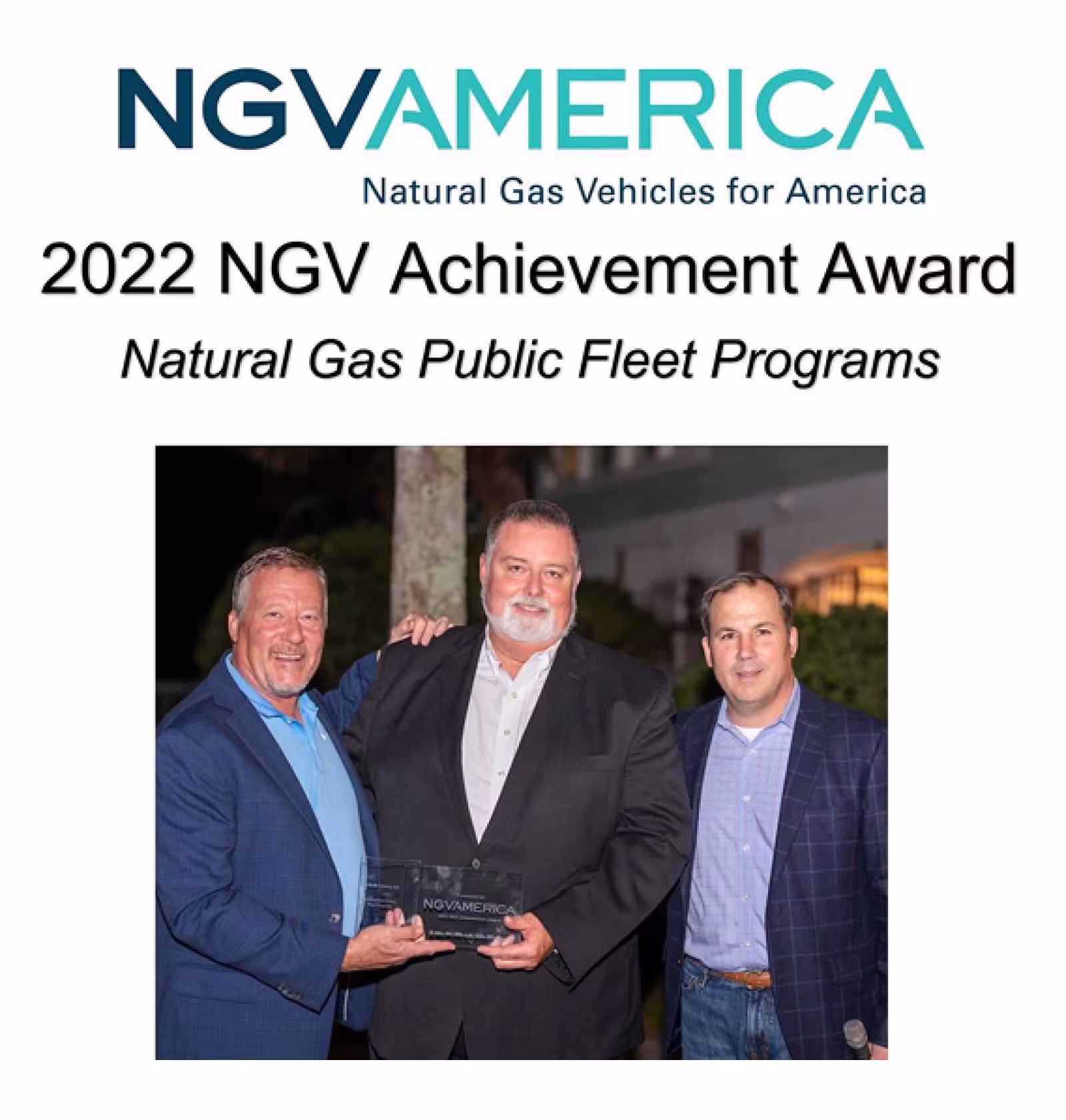 Three men holding an NGVAmerica award plaque at the 2022 NGV Achievement Awards for Natural Gas Public Fleet Programs.