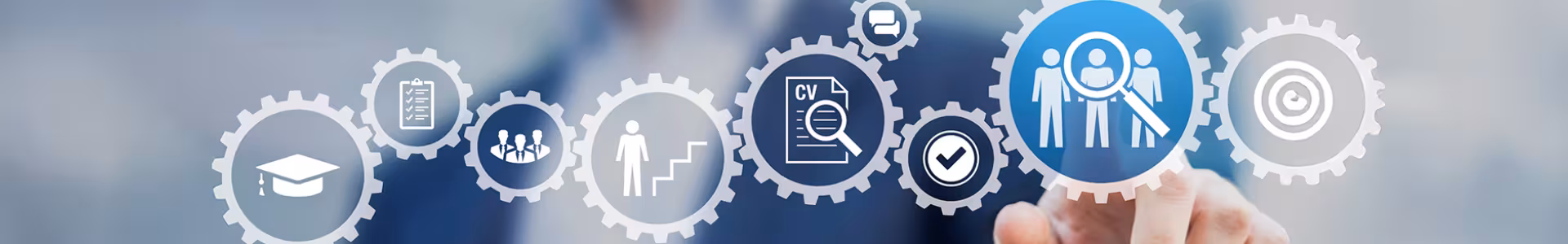 Gears with images depicting education, resumes, and climbing the job ladder leading to a larger one with a man in the background.